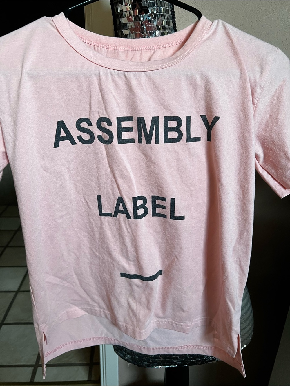Assembly Label Light Pink Tee with Black Logo